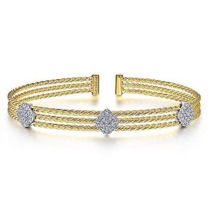 Twisted 14K Yellow Gold Bangle with Three White Gold Diamond Pavé Stations
